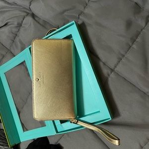 Kate Spade new w/o tags Gold zipper phone wristlet/wallet
